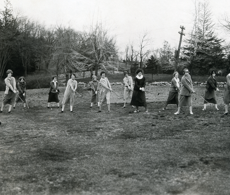 Archival photo of women playing golf at Nehoiden's present day seventh fairway.